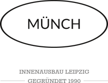 Logo Innenausbau Münch - schwarzes Oval mit schwarzem Schriftzug „Münch“ darin